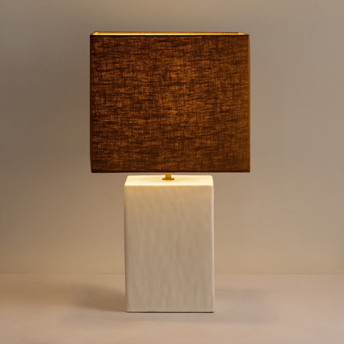 Small Rectangular Gesso Lamp with sculptural rectangular base. Perfect for smaller spaces, this lamp delivers ambient light while serving as a modern accent in any room. W31 x D31 x H55 cm Shop online now at www.nobleandnook.co.uk