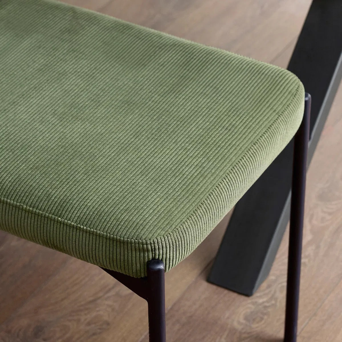 Shop the Leonie Bench in olive green velvet. Its plush upholstery and streamlined design create a refined and inviting presence. Shop onlibe today at www.nobleandnook.co.uk