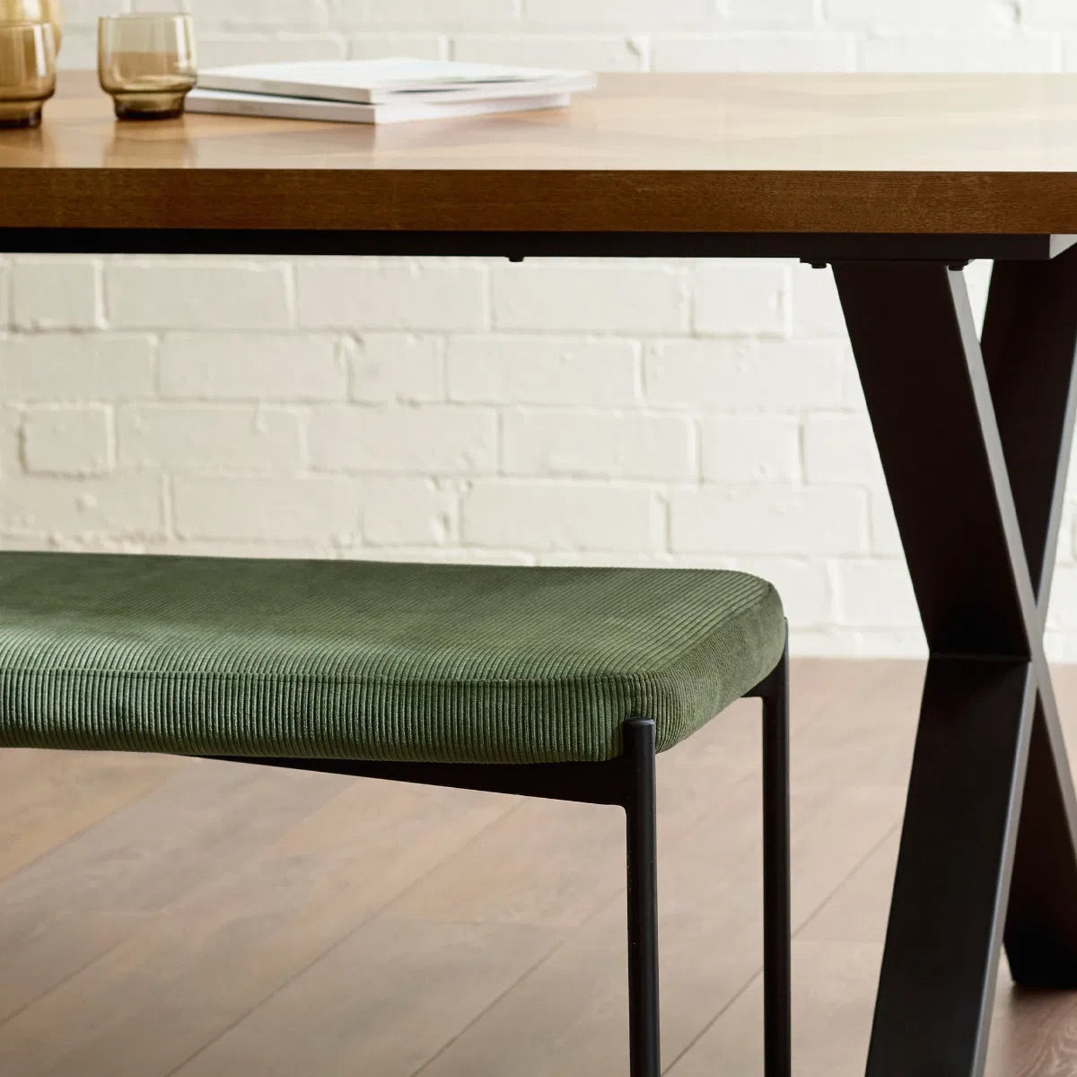 Shop the Leonie Bench in olive green velvet. Its plush upholstery and streamlined design create a refined and inviting presence. Shop onlibe today at www.nobleandnook.co.uk