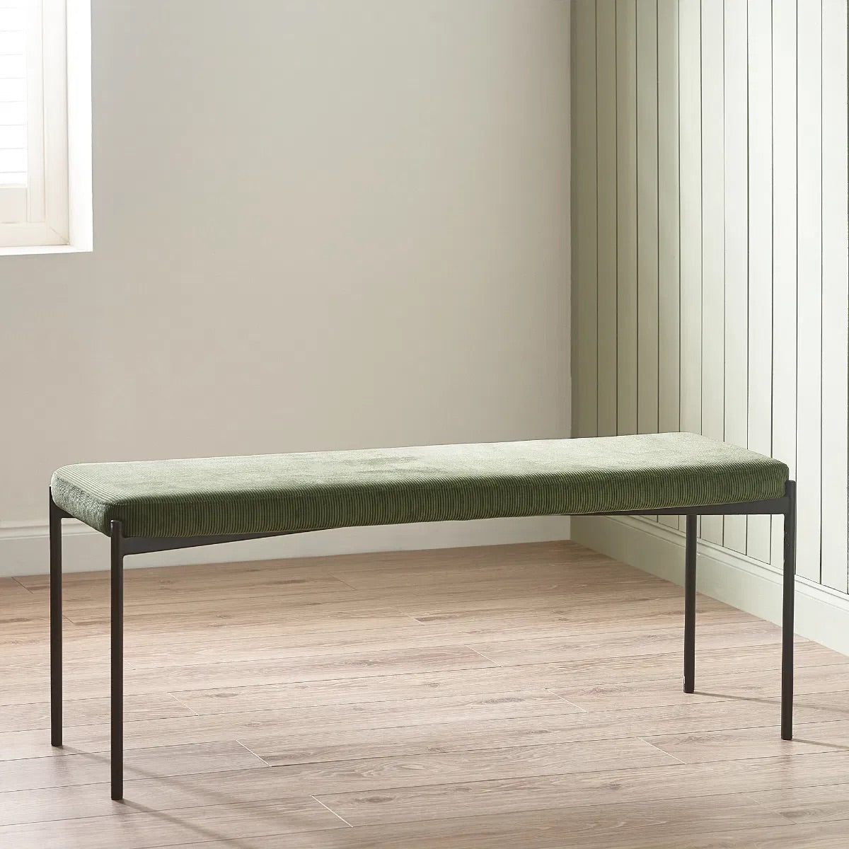 Shop the Leonie Bench in olive green velvet. Its plush upholstery and streamlined design create a refined and inviting presence. Shop onlibe today at www.nobleandnook.co.uk