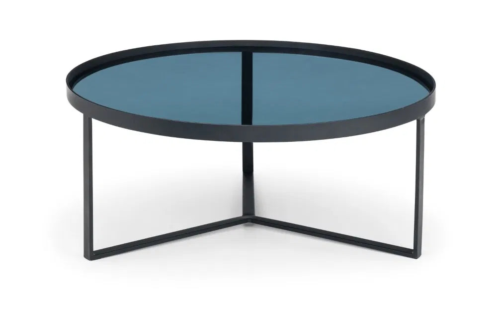 Shop the Soho Coffee Table, a perfect blend of sophistication, featuring a geometric black metal base and a smoked tempered glass top. Shop Online today at www.nobleandnook.co.uk