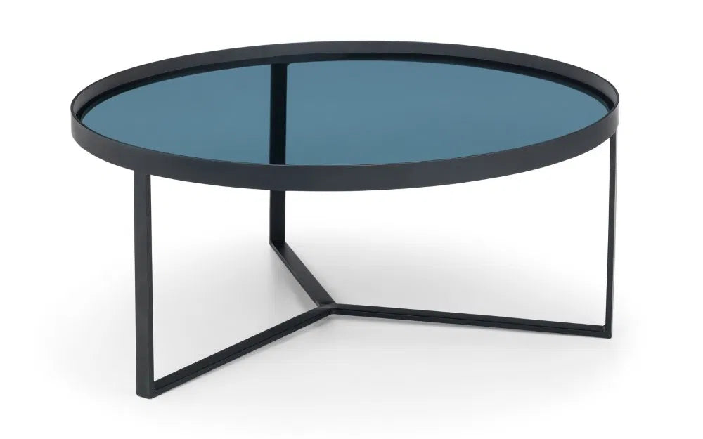 Shop the Soho Coffee Table, a perfect blend of sophistication, featuring a geometric black metal base and a smoked tempered glass top. Shop Online today at www.nobleandnook.co.uk