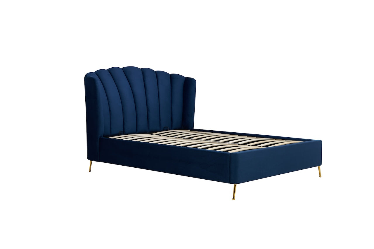 Shop the Lottie Ottoman Bed featuring a pleated and gently winged headboard that adds an elegant art deco touch and is enhanced to by the slim brushed gold feet. Shop online today at www.nobleandnook.co.uk