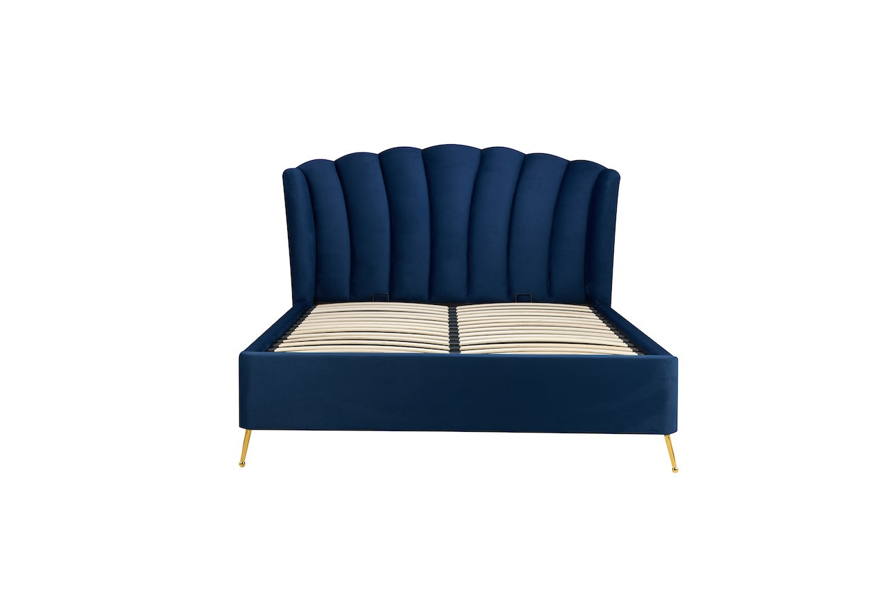 Shop the Lottie Ottoman Bed featuring a pleated and gently winged headboard that adds an elegant art deco touch and is enhanced to by the slim brushed gold feet. Shop online today at www.nobleandnook.co.uk