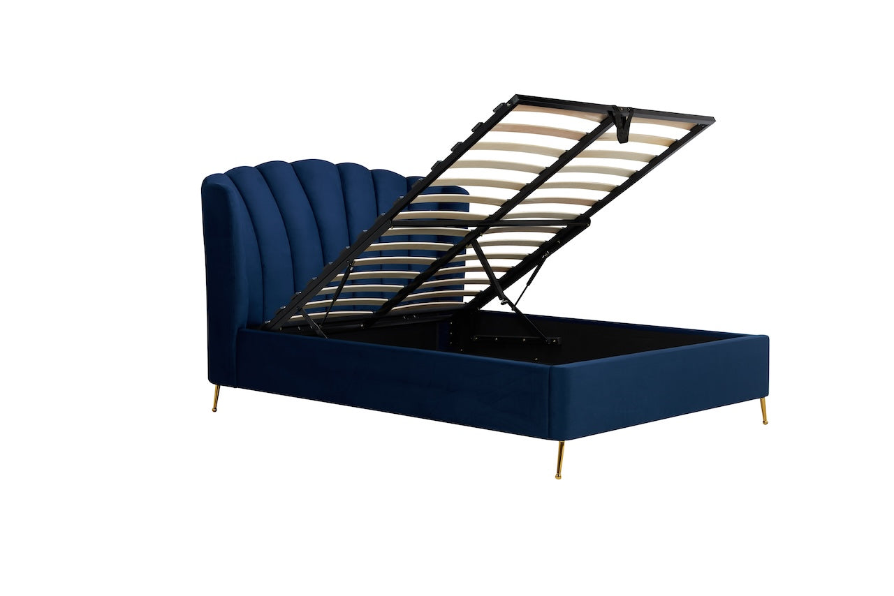Shop the Lottie Ottoman Bed featuring a pleated and gently winged headboard that adds an elegant art deco touch and is enhanced to by the slim brushed gold feet. Shop online today at www.nobleandnook.co.uk