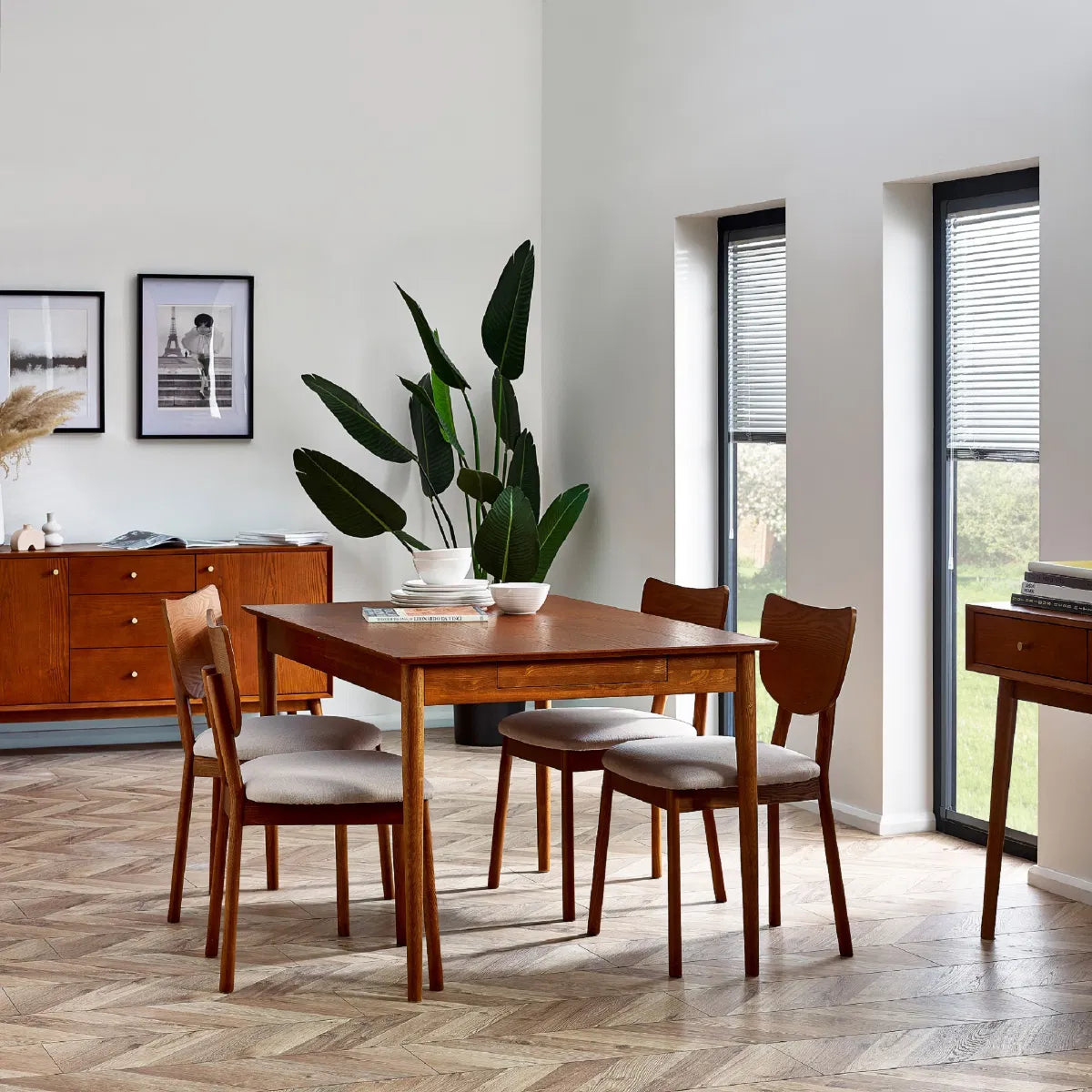 Bring timeless charm and functionality to your dining space with the Lowry Extending Dining Table with 2 Drawers in luxurious cherry ash wood and veneer. H78xD90xW180 cm Shop online today at www.nobleandnook.co.uk