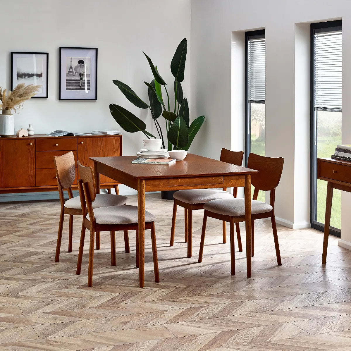 Shop the Lowry Dining Chair with upholstered seat, combining retro-inspired charm with modern craftsmanship, creating a timeless piece for any dining or occasional space. Shop online today at www.nobleandnook.co.uk