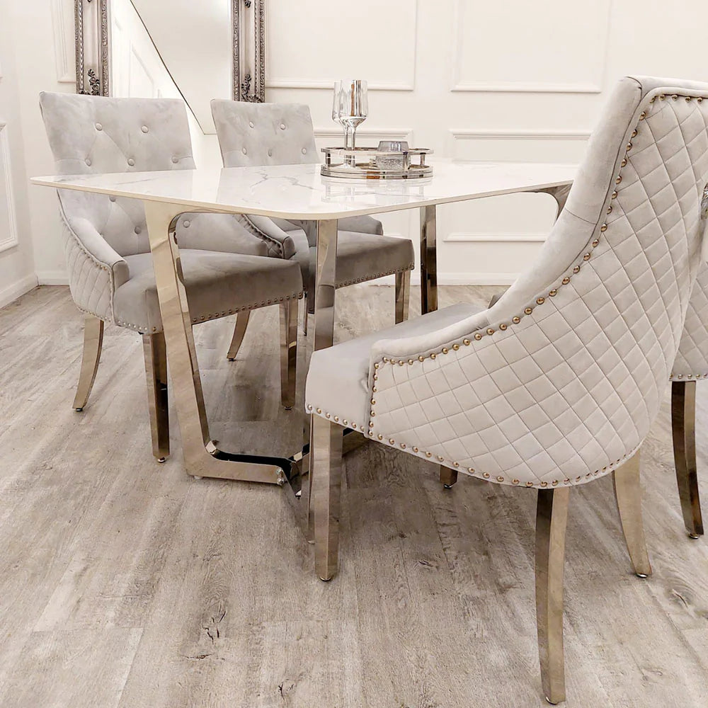 Shop the opulent Lucien Dining Table with Chrome base and luxurious Polar White Sintered Stone Top. At 160cm in length, it can comfortably accommodates 6 chairs. Shop online today at www.nobleandnook.co.uk