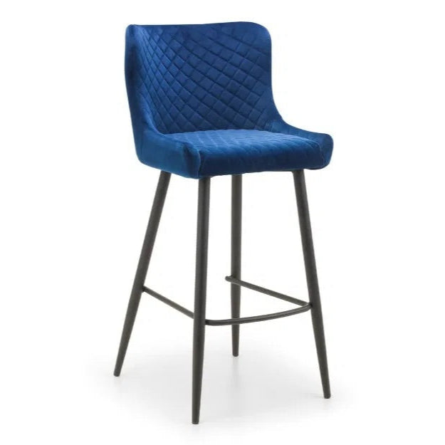 Bring a touch of luxury to your dining space with the Luxe Blue Velvet Bar Stool with sleek black metal legs. Ideal for kitchen islands, home bars, or high counters. Shop online today at www.nobleandnook.co.uk