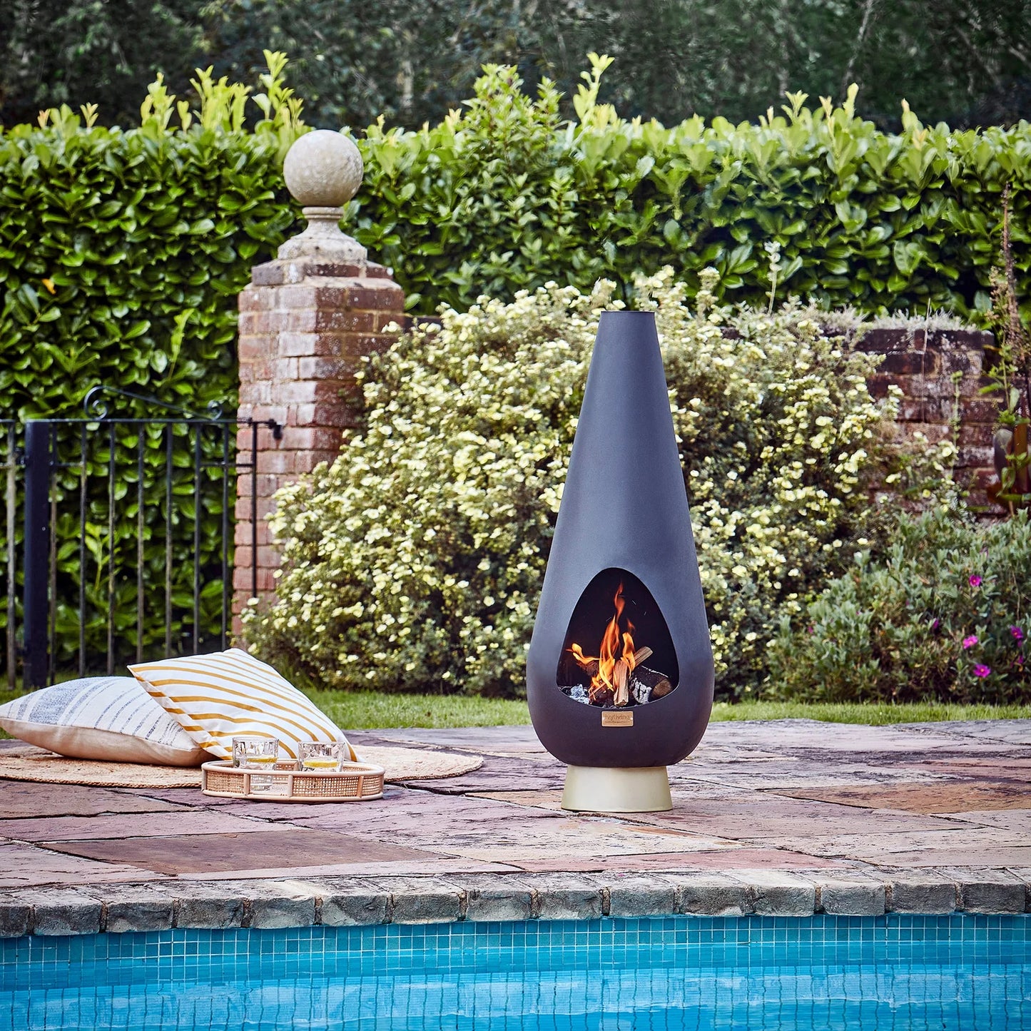 Extend your outdoor evenings with the Leo Fireplace in Matt Black and Antique Gold and keep the outdoors feeling snug and inviting. Shop online now at www.nobleandnook.co.uk