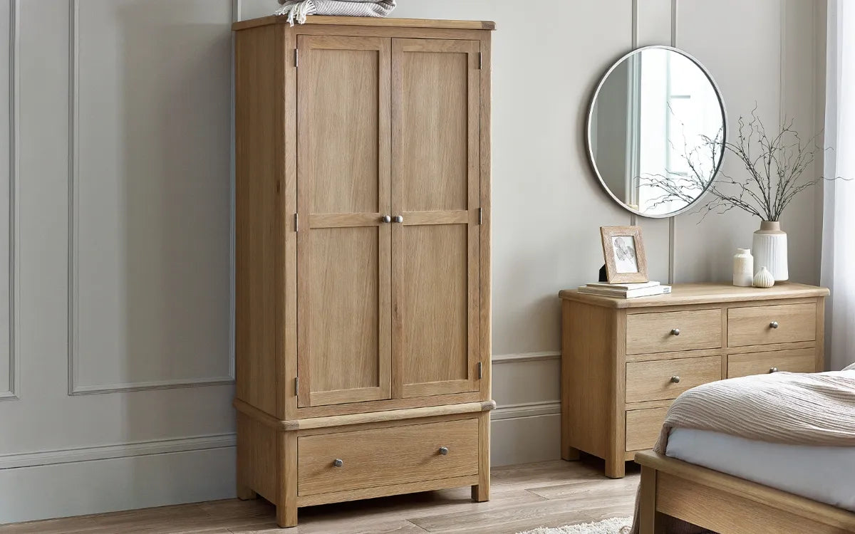 Shop the Memphis double Wardrobe with lower drawer. Finished in exquisite limed oak with gracefully curved edging, this wardrobe is a statement piece. Shop online today at www.nobleandnook.co.uk