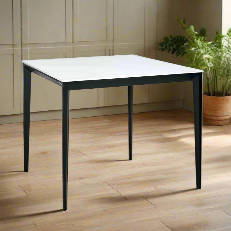 Shop the Miami Square Dining table with white marble-effect sintered stone – heat, stain and scratch resistant and black metal frame. Dimensions: H74xD80xW80cm. Shop online today at www.nobleandnook.co.uk