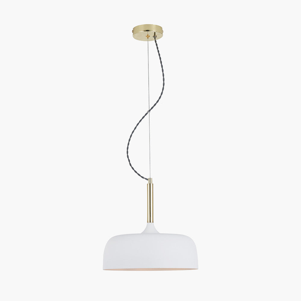 Shop this elegant pendant light featuring a simple yet refined design, with smooth curves and a matt white finish complemented by copper metal accents. Shop online now at www.nobleandnook.co.uk
