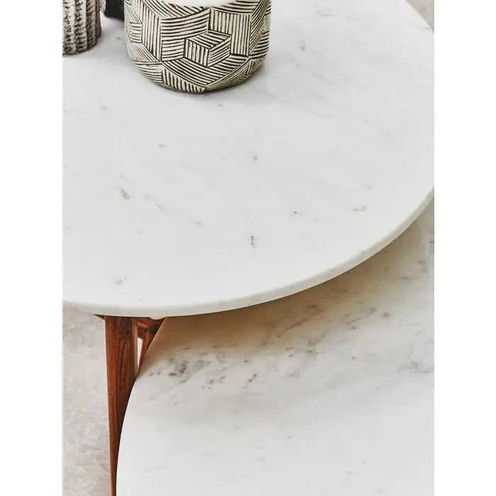 Shop the Myan Coffee Table with White Marble Top, a perfect blend of contemporary design and eco-conscious craftsmanship. Shop online today at www.nobleandnook.co.uk