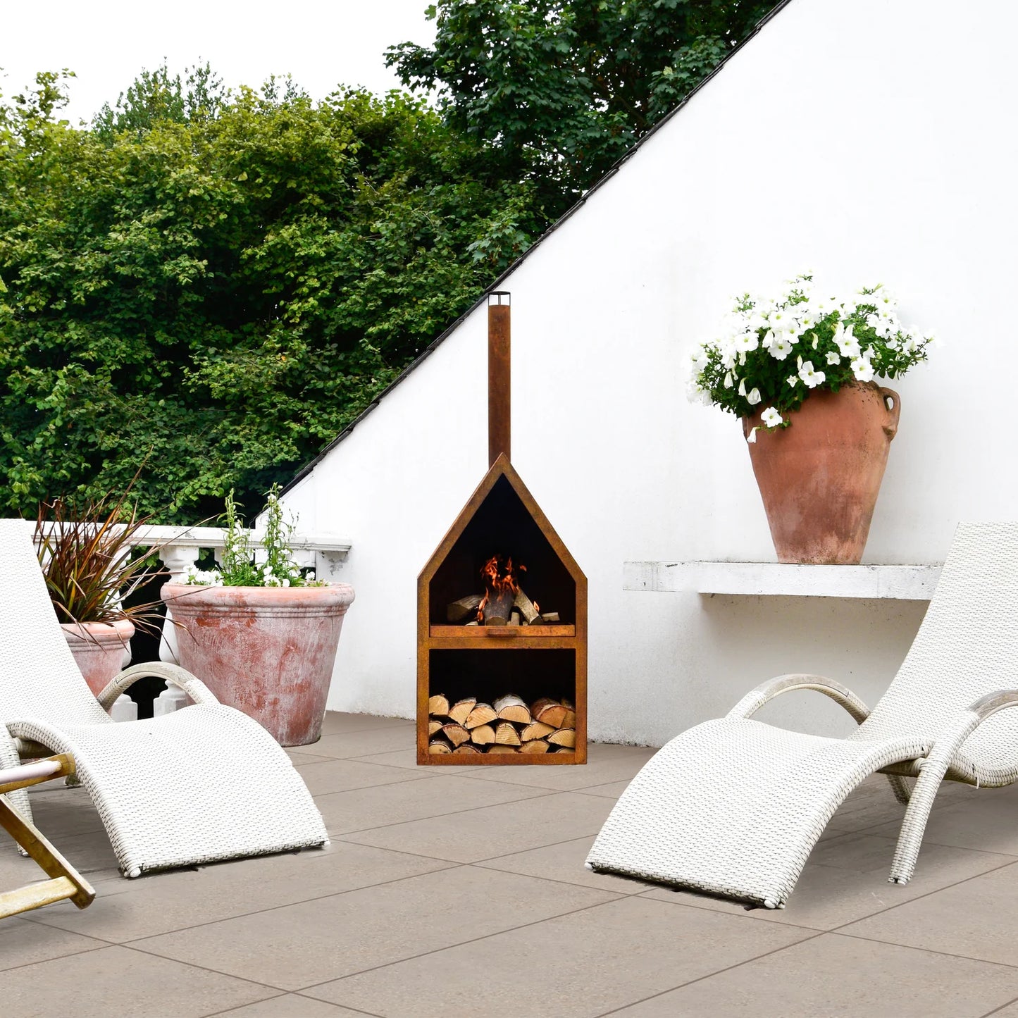 The Outdoor Henley Fireplace with Grill Iron is perfect to enjoy alfresco nights for longer with its warmth and stainless steel griddle, and stay cosy. Shop online now at www.nobleandnook.co.uk