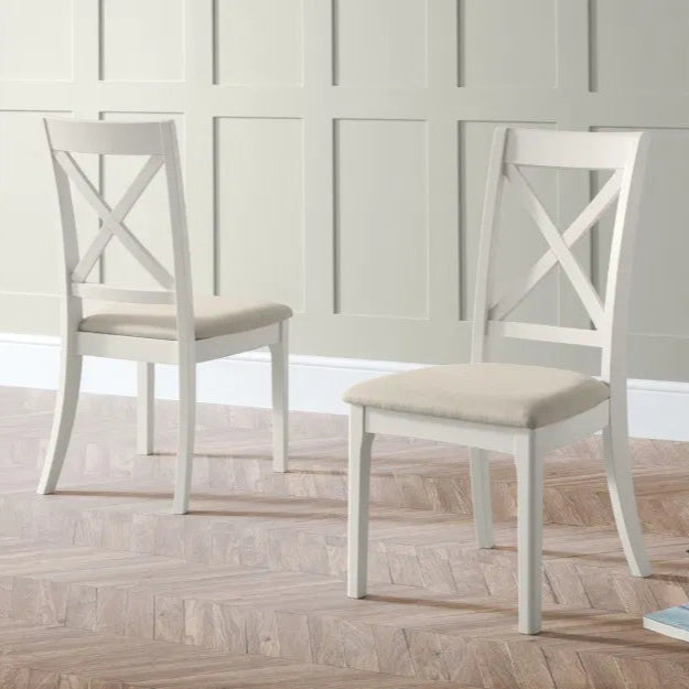 Shop the Provence dining chair, designed to suit both contemporary and traditional homes. Finished in grey lacquer and upholstered in soft ivory fabric. Pair with the Provence dining table for a complete set. Shop online today www.nobleandnook.co.uk