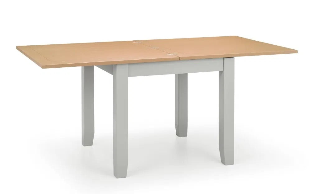 Shop the Richmond Flip-Top Dining Table. Doubles in size from 90cm to 180cm for extra seating when needed. Built to last with quality materials. Ideal for compact dining areas. Shop online today at www.nobleandnook.co.uk
