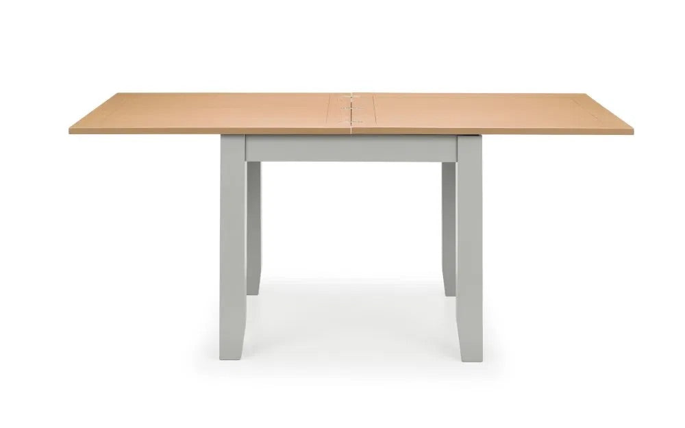 Shop the Richmond Flip-Top Dining Table. Doubles in size from 90cm to 180cm for extra seating when needed. Built to last with quality materials. Ideal for compact dining areas. Shop online today at www.nobleandnook.co.uk