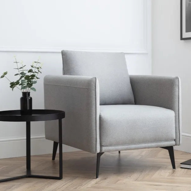 Shop the Rhoe chair, with light grey wool effect fabric and removable bolster cushions to provide ultimate comfort. FREE UK Mainland Delivery. Shop online today at www.nobleandnook.co.uk