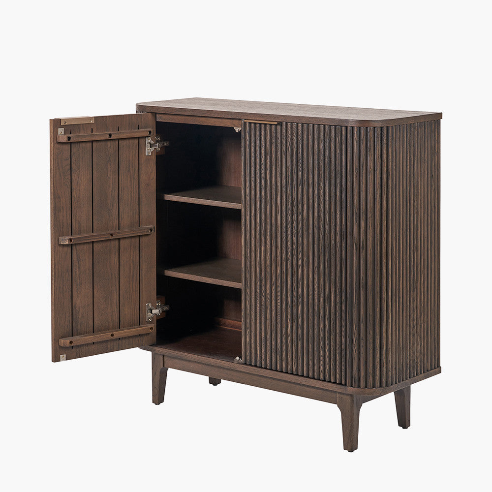 Designed with a striking ribbed oak and pine wood façade and whether used as a drinks cabinet or a statement storage piece, this elegant cabinet adds instant luxury to any interior. Shop online now at www.nobleandnook.co.uk