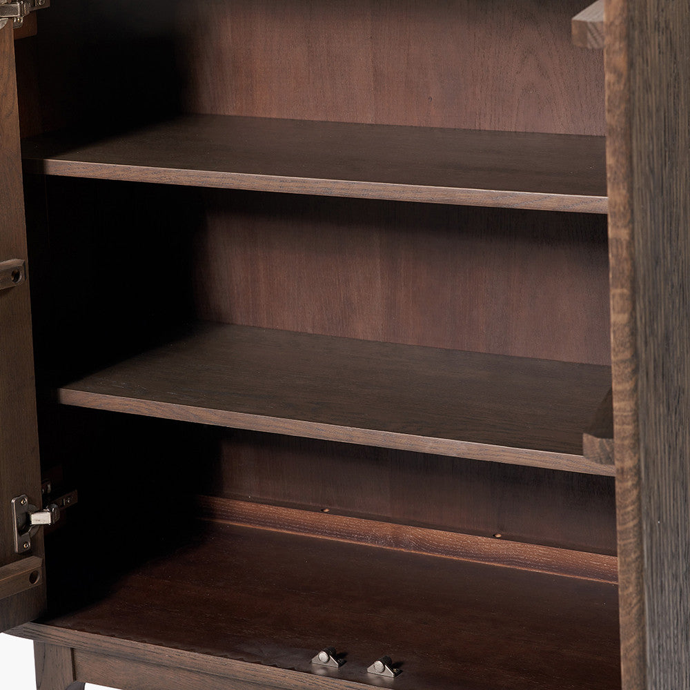 Designed with a striking ribbed oak and pine wood façade and whether used as a drinks cabinet or a statement storage piece, this elegant cabinet adds instant luxury to any interior. Shop online now at www.nobleandnook.co.uk