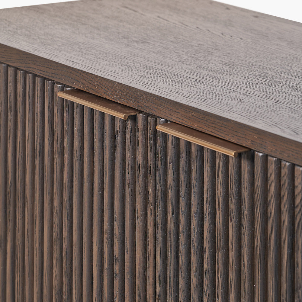 Designed with a striking ribbed oak and pine wood façade and whether used as a drinks cabinet or a statement storage piece, this elegant cabinet adds instant luxury to any interior. Shop online now at www.nobleandnook.co.uk