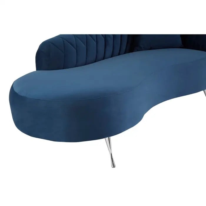 This Dark Blue Velvet Chaise Longue is a sophisticated fusion of modern design and timeless elegance. Ideal for contemporary interiors with a classic touch. Shop online today at www.nobleandnook.co.uk