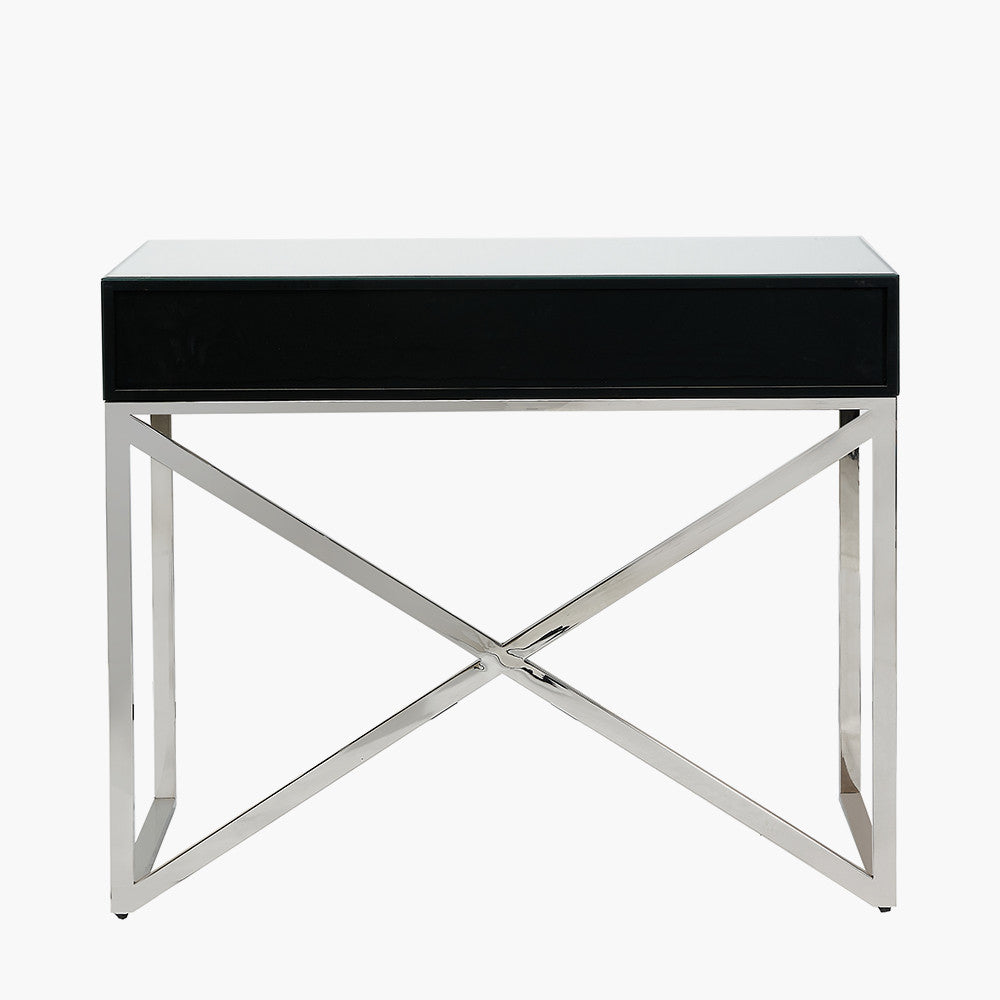 Shop this mirrored glass desk, designed to make a statement. With two spacious drawers, complete with slimline silver handles. Shop online today at www.nobleandnook.co.uk