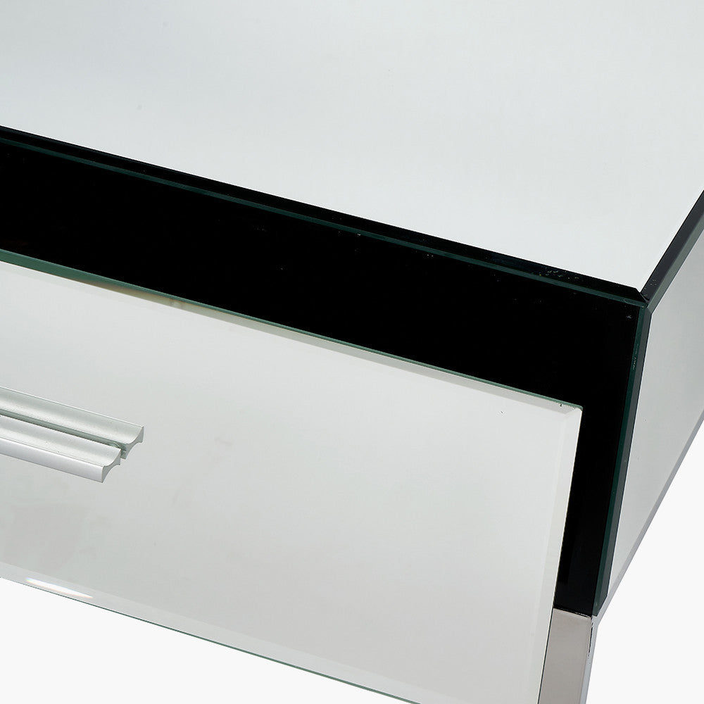 Shop this mirrored glass desk, designed to make a statement. With two spacious drawers, complete with slimline silver handles. Shop online today at www.nobleandnook.co.uk