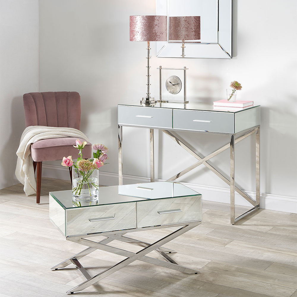 Shop this mirrored glass desk, designed to make a statement. With two spacious drawers, complete with slimline silver handles. Shop online today at www.nobleandnook.co.uk