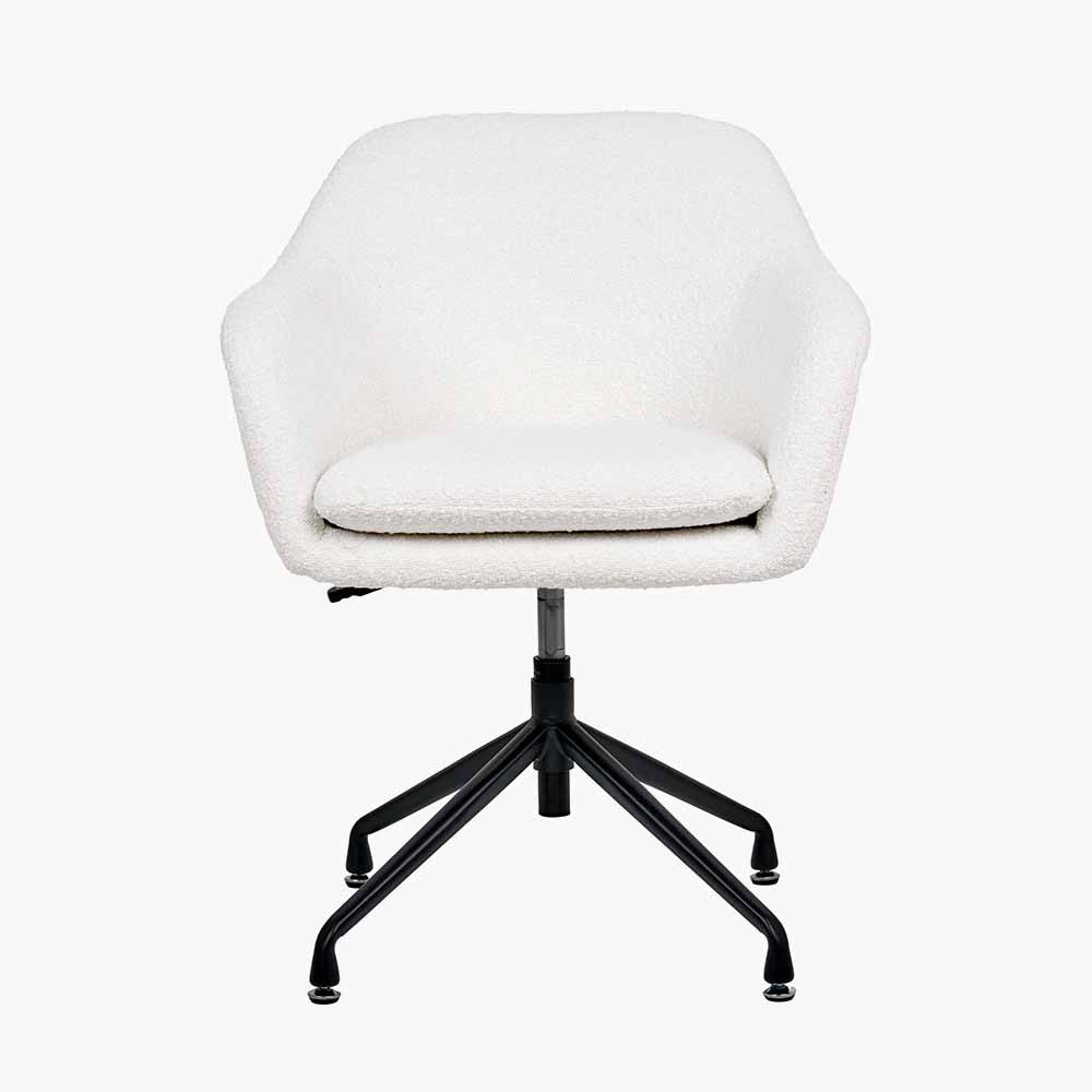 Shop the Rosolini home office chair, upholstered in soft bouclé fabric, with swivel and adjustable height function for personalised comfort. Shop online today at www.nobleandnook.co.uk
