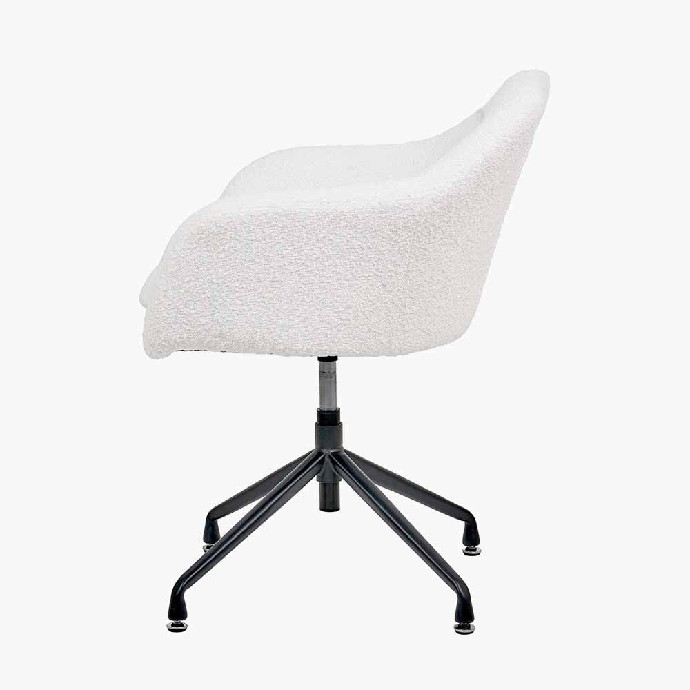 Shop the Rosolini home office chair, upholstered in soft bouclé fabric, with swivel and adjustable height function for personalised comfort. Shop online today at www.nobleandnook.co.uk