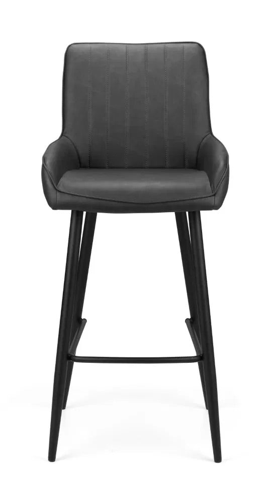 Shop the Soho Black Faux Leather Barstool. Great for kitchen islands, home bars, or casual dining areas, this barstool delivers both function and flair. Shop online today at www.nobleandnook.co.uk
