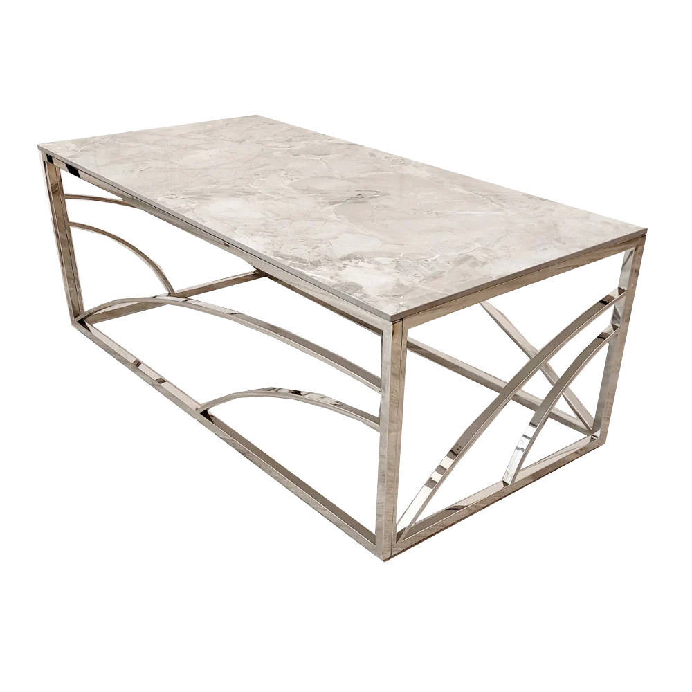 Shop today and enhance your living space with this Chrome Coffee Table, a perfect fusion of art deco inspired style and practicality, featuring a stunning marble effect Sintered Stone top. Shop online today at www.nobleandnook.co.uk