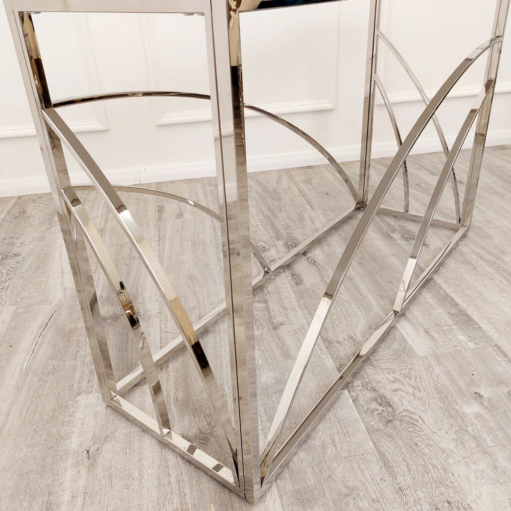 Shop now to define your interior design with this Chrome Framed art deco inspired Console Table, featuring a marble effect Sintered Stone top gold tone. Perfectly suited for hallways. Shop online today at www.nobleandnook.co.uk