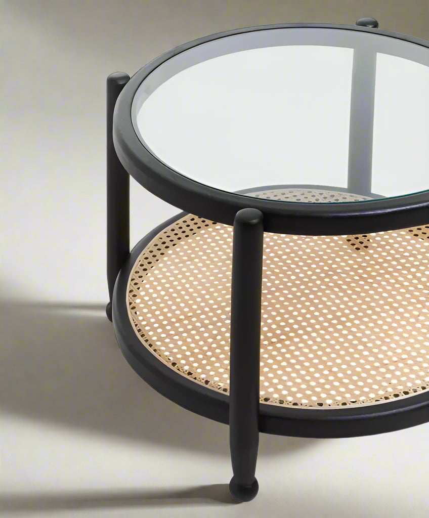 Shop the Savanna Coffee Table crafted from eco-friendly elm wood, finished with a black frame with clean lines and rounded corners and clear glass top. Shop online today at www.nobleandnook.co.uk
