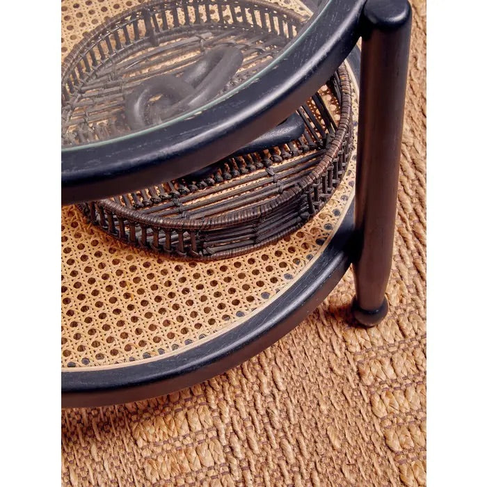 Shop the Savanna Coffee Table crafted from eco-friendly elm wood, finished with a black frame with clean lines and rounded corners and clear glass top. Shop online today at www.nobleandnook.co.uk