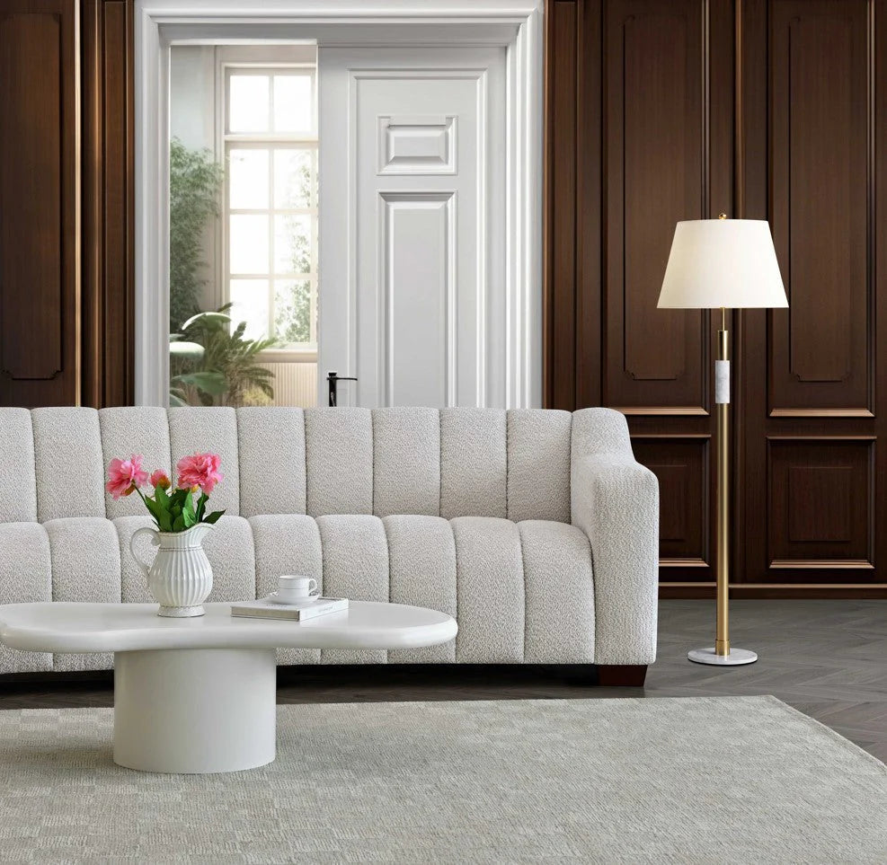 Indulge in luxury with the Aluxo Astoria 3 Seater Sofa in Oatmeal Boucle Fabric. An exquisite piece featuring deep channel stitching and adorned with a soft and alluring boucle fabric in a stunning Oatmeal hue. Shop online today at www.nobleandnook.co.uk