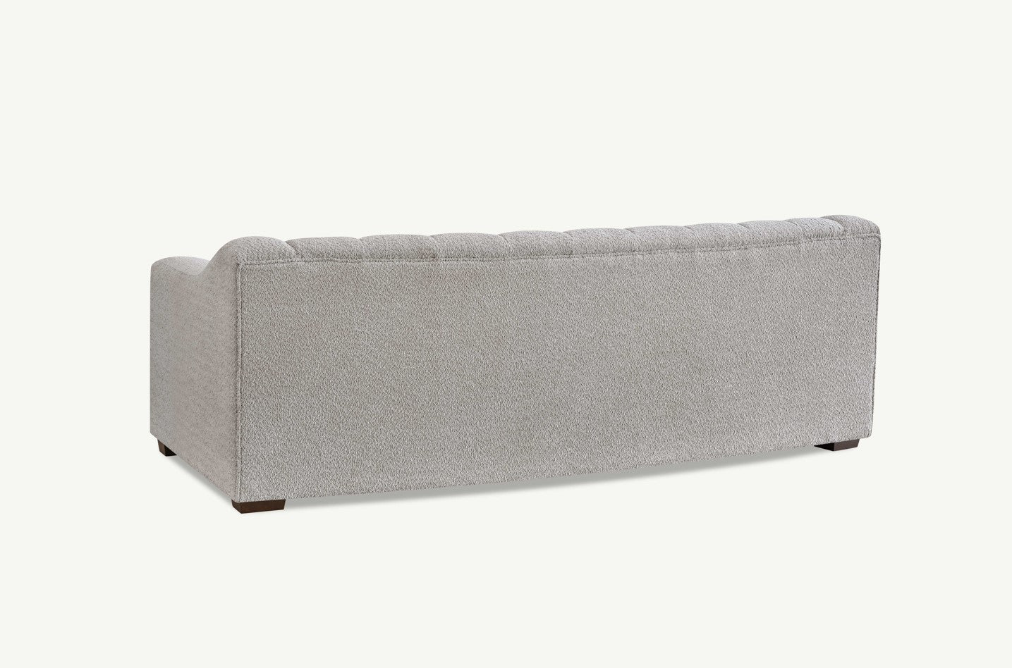 Indulge in luxury with the Aluxo Astoria 3 Seater Sofa in Oatmeal Boucle Fabric. An exquisite piece featuring deep channel stitching and adorned with a soft and alluring boucle fabric in a stunning Oatmeal hue. Shop online today at www.nobleandnook.co.uk