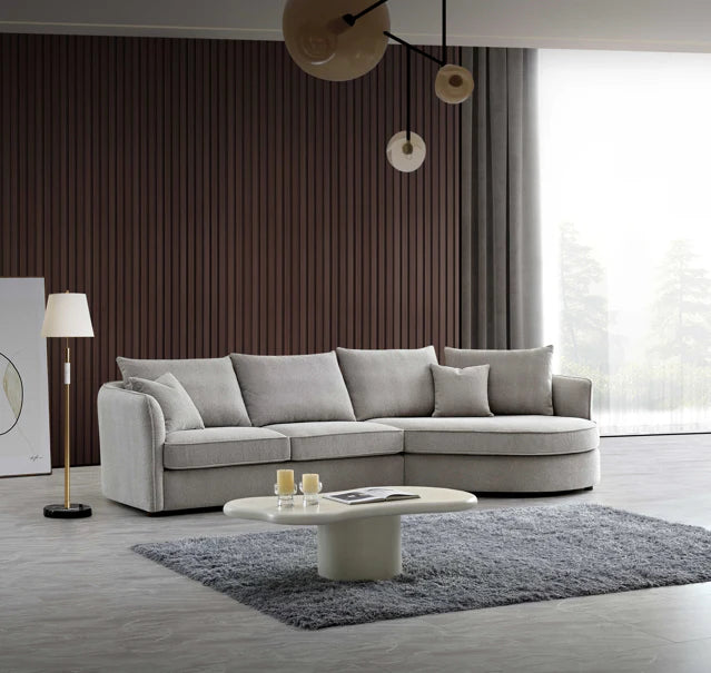 Shop the Aluxo Rubin Corner Chaise in Pebble Boucle, the epitome of luxury and comfort. It's organic curves and contemporary boucle fabric, in a range of neutral tones, make it a statement piece in any home. Shop online today at www.nobleandnook.co.uk