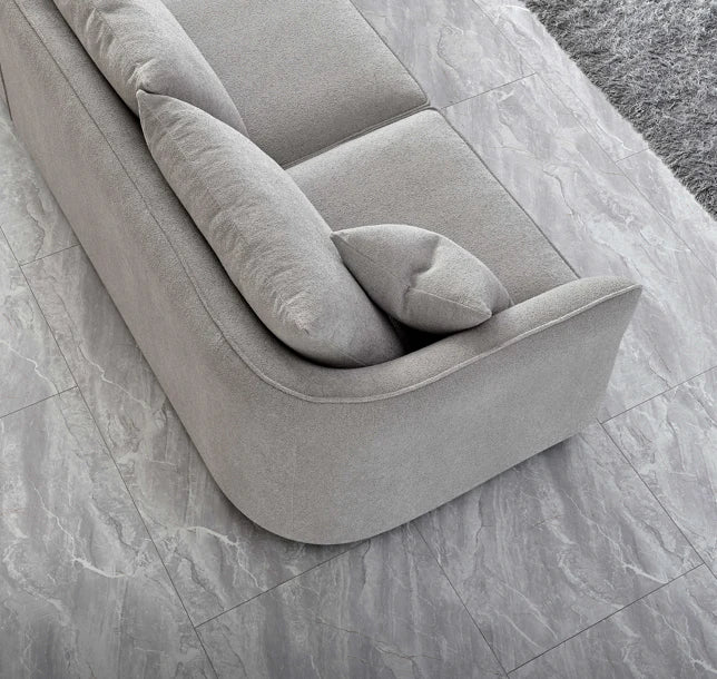 Shop the Aluxo Rubin Corner Chaise in Pebble Boucle, the epitome of luxury and comfort. It's organic curves and contemporary boucle fabric, in a range of neutral tones, make it a statement piece in any home. Shop online today at www.nobleandnook.co.uk