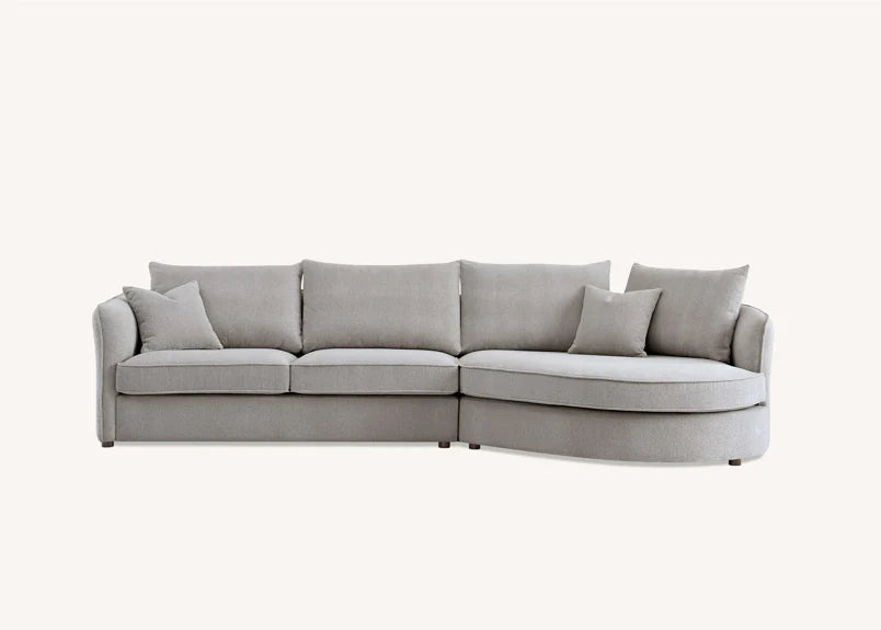 Shop the Aluxo Rubin Corner Chaise in Pebble Boucle, the epitome of luxury and comfort. It's organic curves and contemporary boucle fabric, in a range of neutral tones, make it a statement piece in any home. Shop online today at www.nobleandnook.co.uk