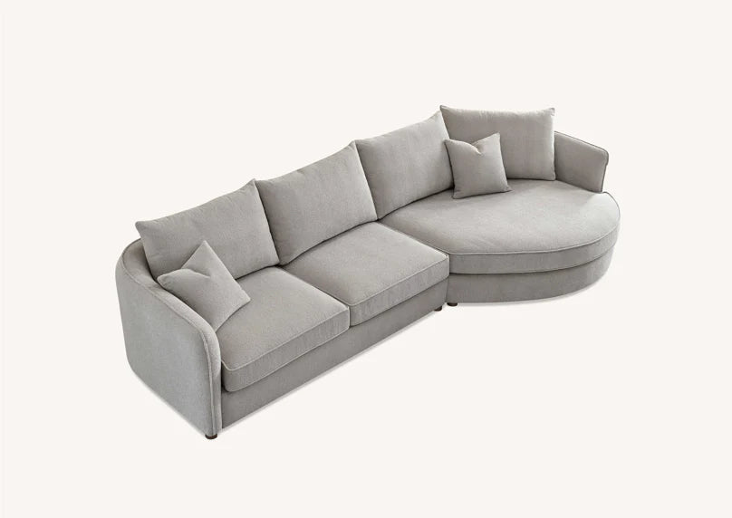 Shop the Aluxo Rubin Corner Chaise in Pebble Boucle, the epitome of luxury and comfort. It's organic curves and contemporary boucle fabric, in a range of neutral tones, make it a statement piece in any home. Shop online today at www.nobleandnook.co.uk