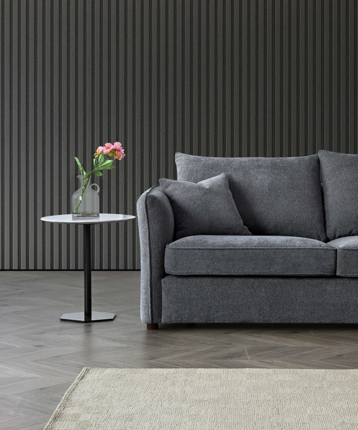 Shop the Aluxo Rubin Corner Chaise in Charcoal Bouclé, the epitome of luxury and comfort. It's organic curves and contemporary bouclé fabric make it a statement piece in any home. Shop online today at www.nobleandnook.co.uk
