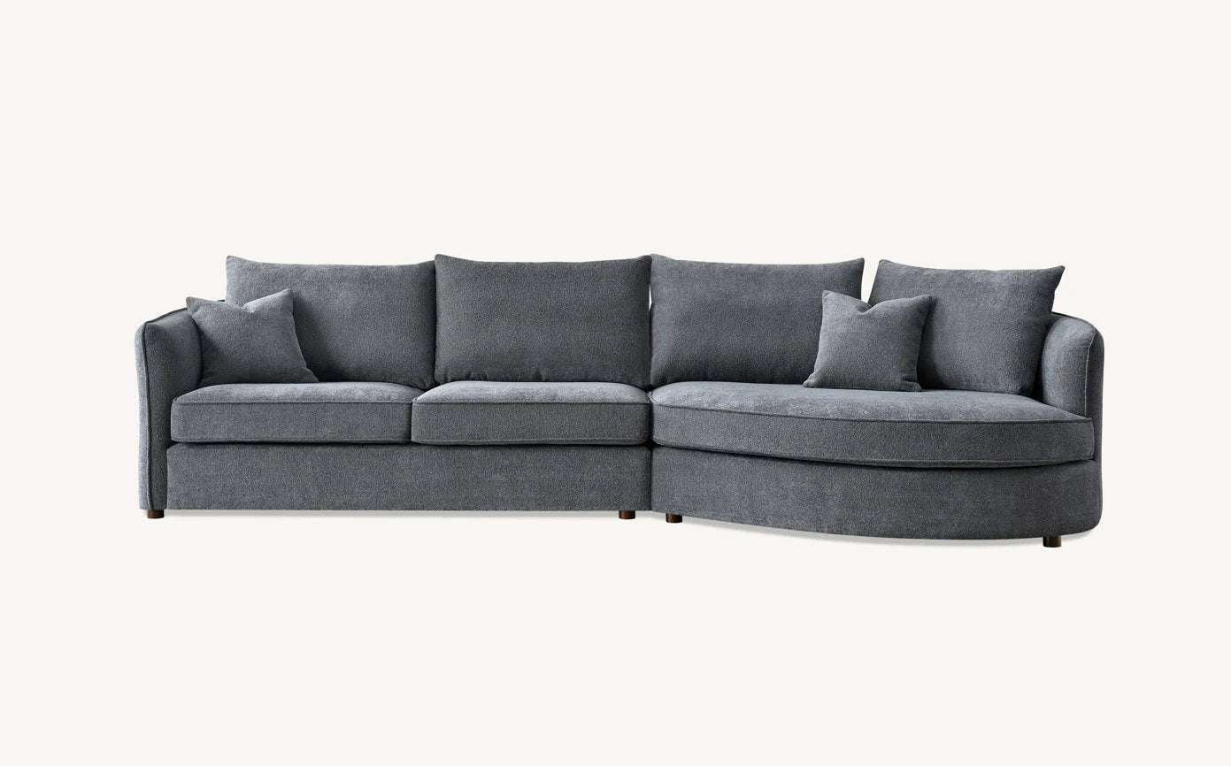Shop the Aluxo Rubin Corner Chaise in Charcoal Bouclé, the epitome of luxury and comfort. It's organic curves and contemporary bouclé fabric make it a statement piece in any home. Shop online today at www.nobleandnook.co.uk