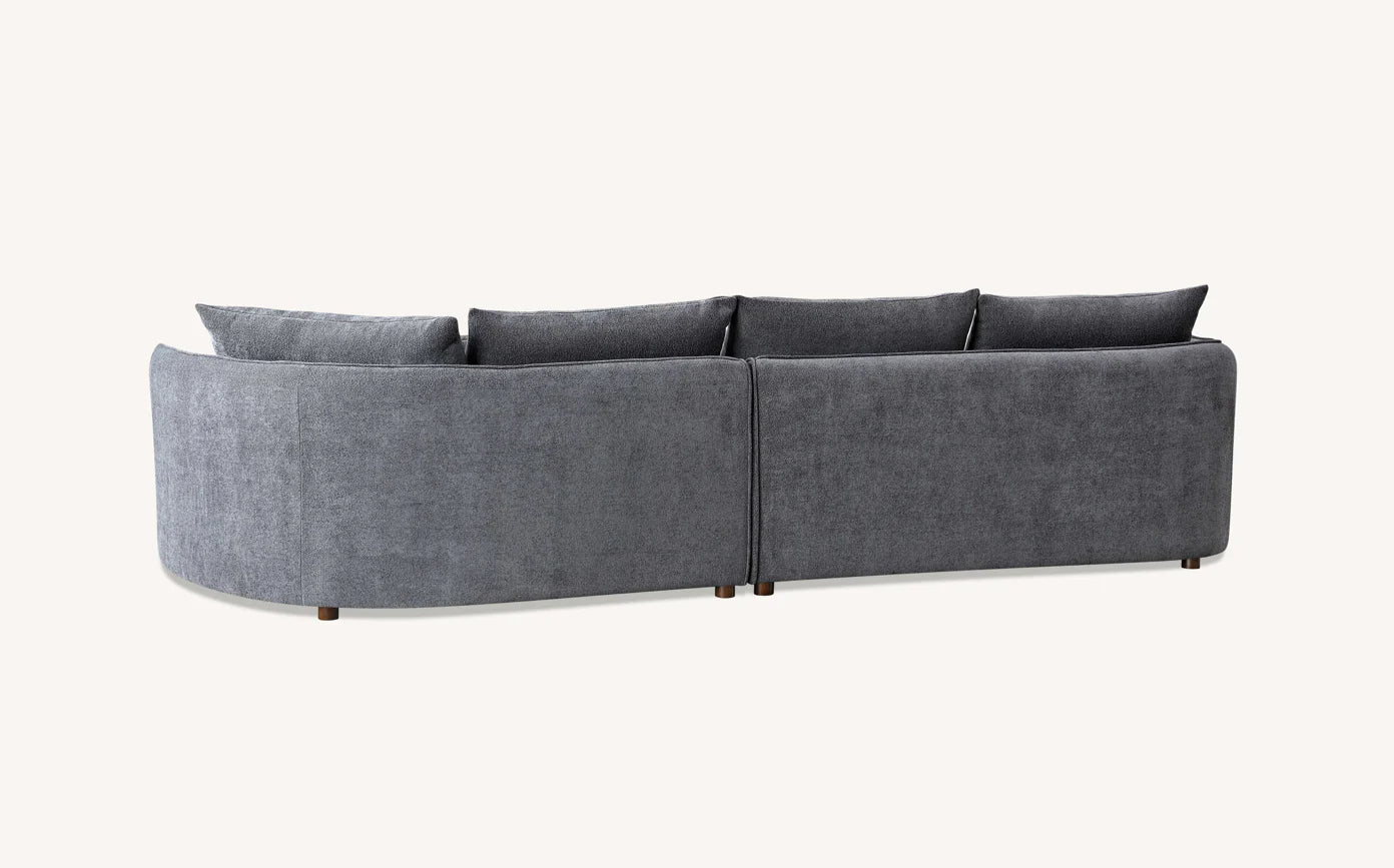 Shop the Aluxo Rubin Corner Chaise in Charcoal Bouclé, the epitome of luxury and comfort. It's organic curves and contemporary bouclé fabric make it a statement piece in any home. Shop online today at www.nobleandnook.co.uk