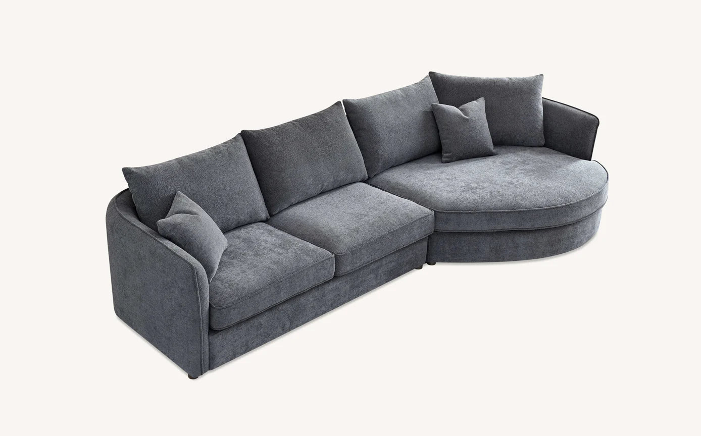 Shop the Aluxo Rubin Corner Chaise in Charcoal Bouclé, the epitome of luxury and comfort. It's organic curves and contemporary bouclé fabric make it a statement piece in any home. Shop online today at www.nobleandnook.co.uk
