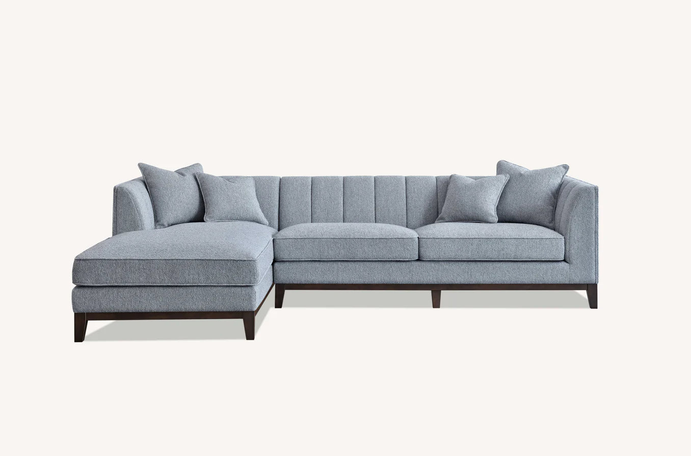 Shop the Cooper Left Hand Corner Group, showcasing the perfect blend of mid-century comfort and design. This timeless design and modern sofa boasts squared edges, sleek lines, and a minimalist silhouette. Shop online now at www.nobleandnook.co.uk