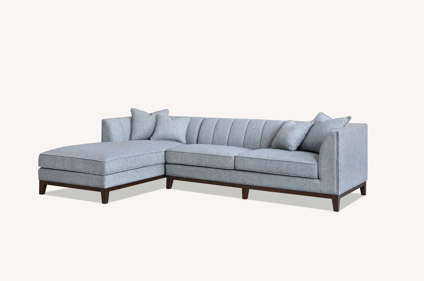 Shop the Cooper Left Hand Corner Group, showcasing the perfect blend of mid-century comfort and design. This timeless design and modern sofa boasts squared edges, sleek lines, and a minimalist silhouette. Shop online now at www.nobleandnook.co.uk