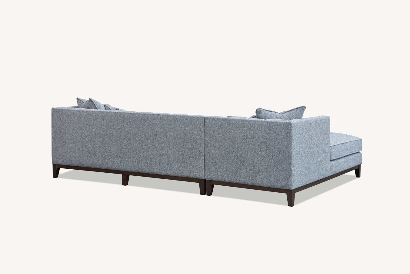 Shop the Cooper Left Hand Corner Group, showcasing the perfect blend of mid-century comfort and design. This timeless design and modern sofa boasts squared edges, sleek lines, and a minimalist silhouette. Shop online now at www.nobleandnook.co.uk